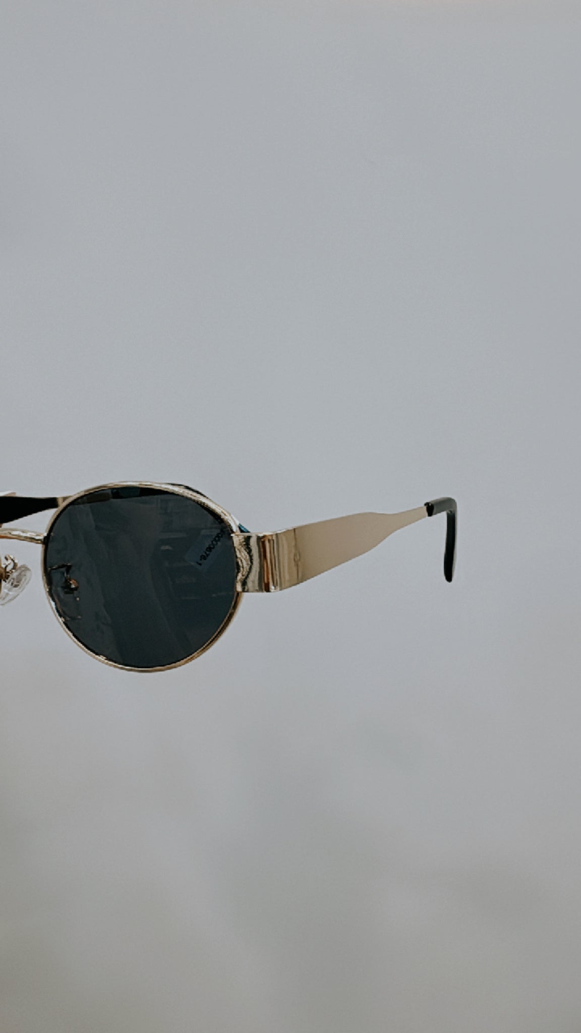 Oval Gold Frame Sunglasses