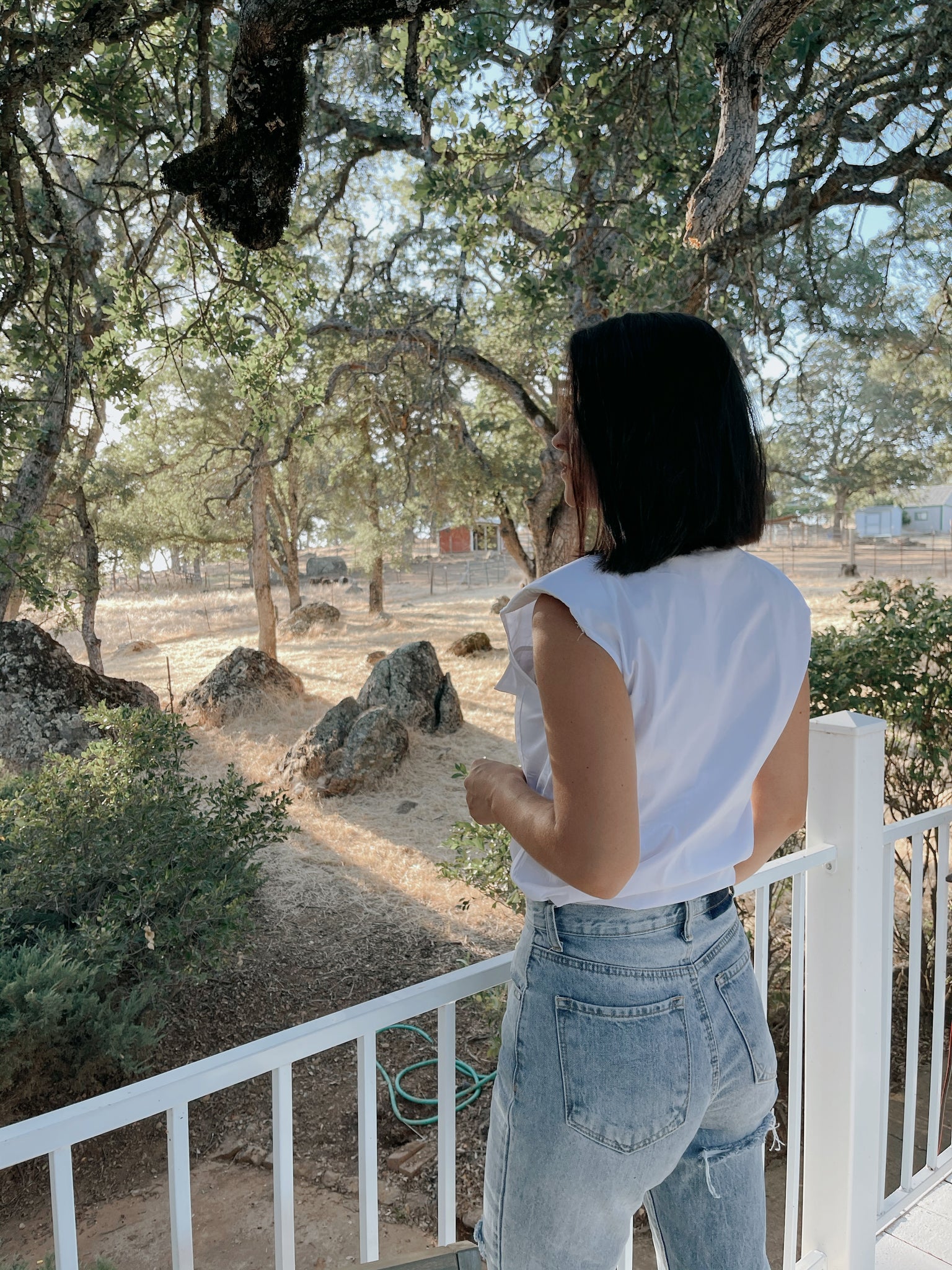 Chic White Sleeveless Button-Up Blouse
