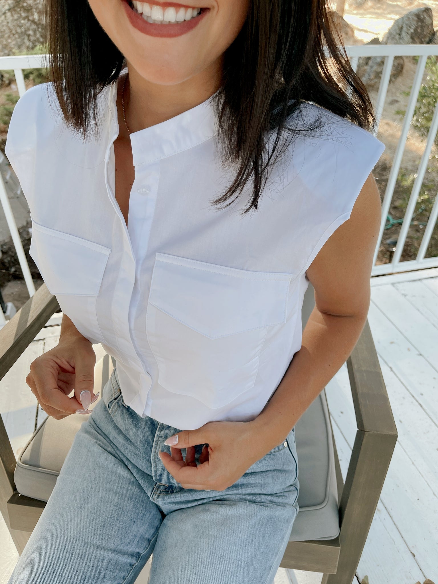 Chic White Sleeveless Button-Up Blouse